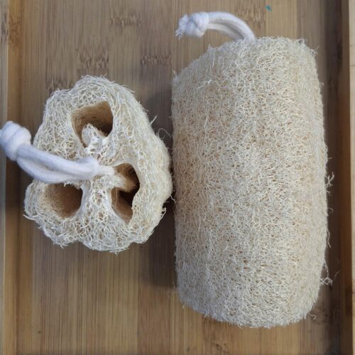 Wholesale natural loofah sections in S, M, and L sizes for soap making and skincare.