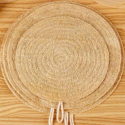 Wholesale natural loofah steamer mat in 8-inch and 9.5-inch sizes for non-stick cooking.